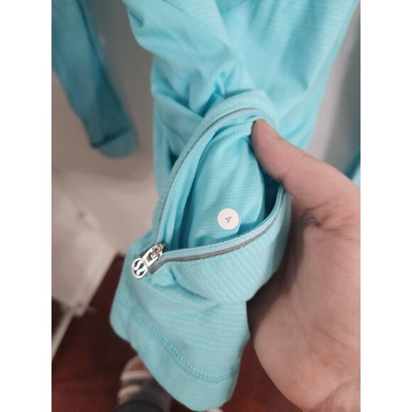 Lululemon full tilt half zip  ruffle turquoise star runner top 4 - Picture 6 of 6